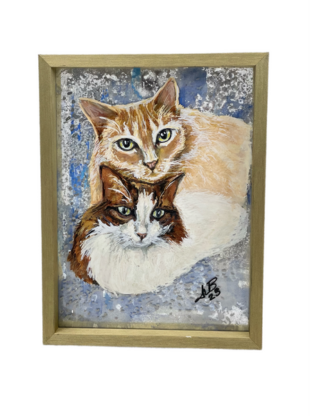 Framed painted portrait on glass.